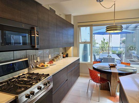 Downtown San Diego luxury high-rise condominium with modern flat-panel cabinets and integrated handles.