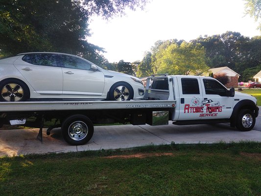 Flat bed tow truck