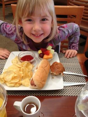 Hot dog with huge coloring book.