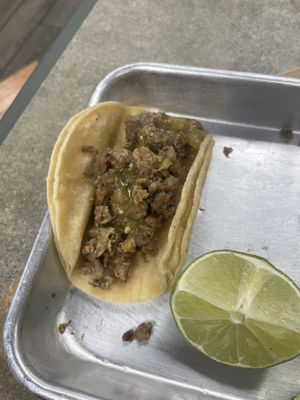 Asada taco with salsa verde