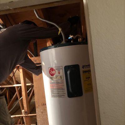 If it wasn't hot enough already in this attic, Wes busted out a torch to get the job done as fast as possible.