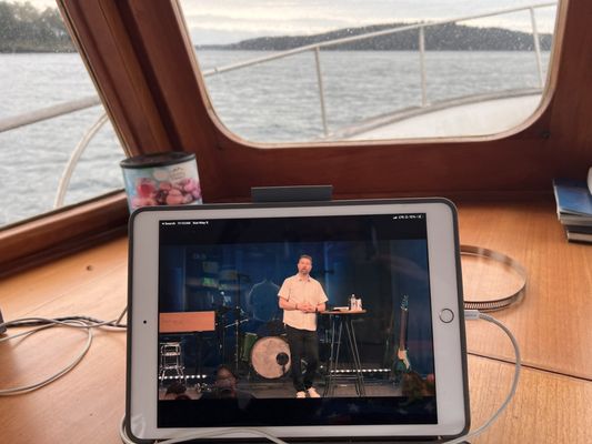 Church online via iPad live and boating.  Aaron giving the Message whilst on the Salish Sea.