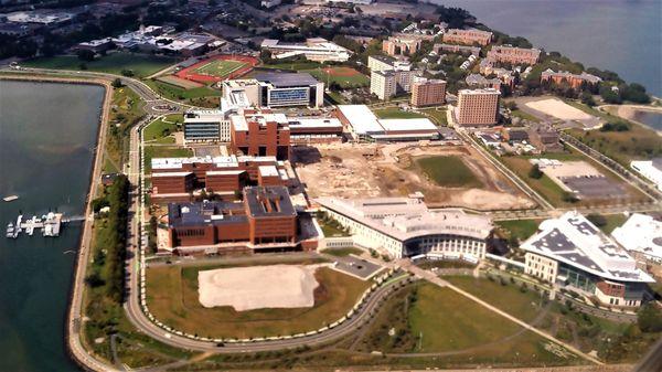 On approach to BOS, you can see the urban UMass Boston campus, which obviously has areas being readied for new construction. (no review)