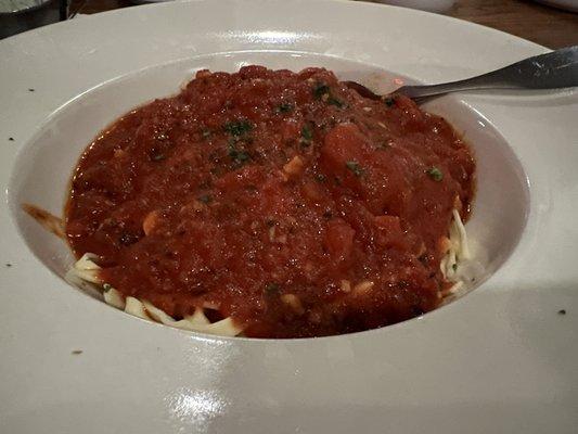 Homemade pasta with marinara sauce