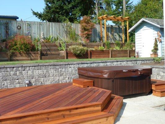 Shoreline deck, retaining wall, and hot tub