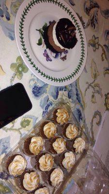 Chocolate cake and mini carrot cake cupcakes.