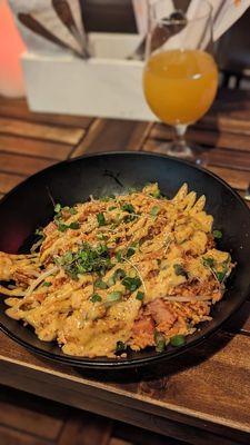 A bowl of Crab Fat Fried Rice & Guapo (to drink)