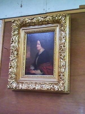 A lovely gold leaf framed oil painting.  Frame needed carvings replaced and gold leafed to match rest of frame.