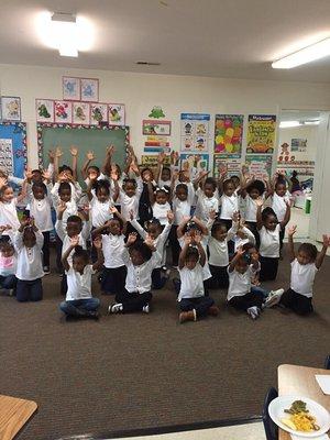 Our hands are up because we know the answer.  (Early learning is key for adult success)