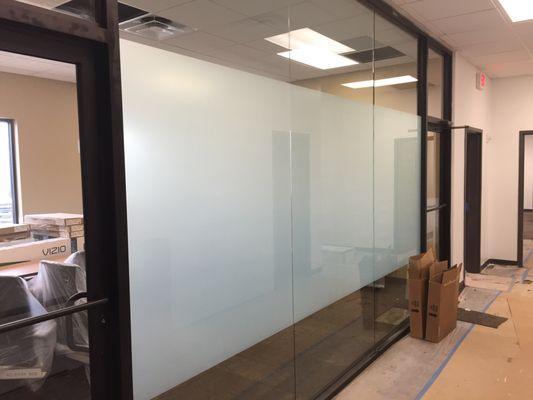 Frosted film for privacy. Great for meeting rooms and offices