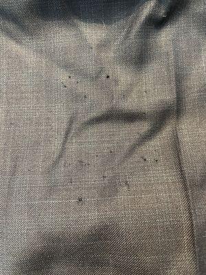 Suit pants with holes