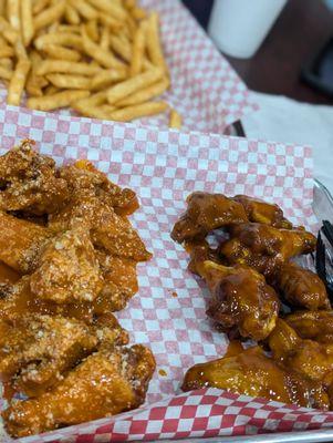 Fan pack. 18 Half and half boneless, bone-in buffalo Parmesan and mango Habanero wings, large portion of fries.