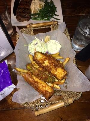 Fish and chips: beer battered cod with seasoned fries, slaw, and "chimayo" for dipping