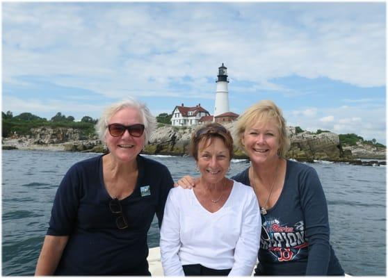 Three happy sailors on the seas in Casco Bay!