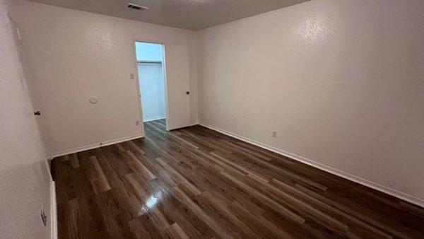 master bedroom with walk in closet