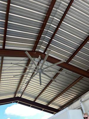 Outdoor industrial fan on a carport/ open garage