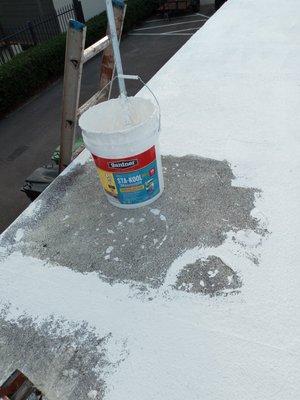 Reseal flat roof.