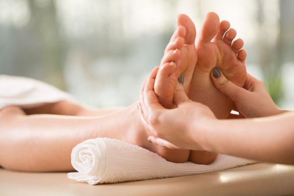 Foot massage reflexology.