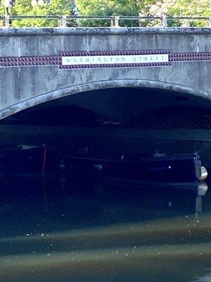 Bridge with gondolas and Waterfire wood fire boats underneath.      Hard to see.  But they are there!