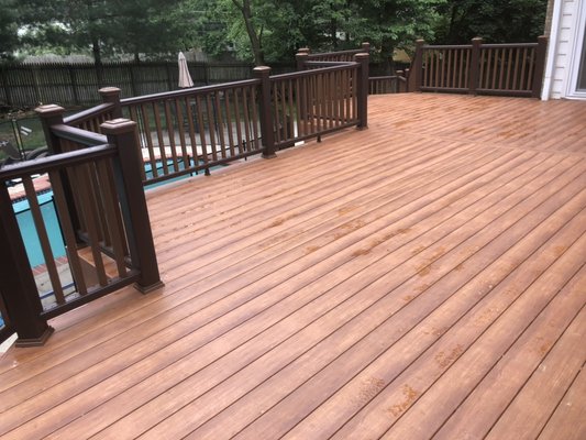 Deck Restoration with ZURI Decking and Trex Transcends Rail...! A PVC decking with the look of the hardwood floor.