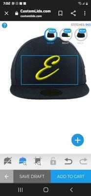 Navy blue hat with Highlighter yellow E in the font in this photo no light blue box Just the E on the hat