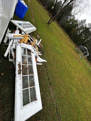 Debris that was left on our porch and we had to clean up and throw over the fence as we have dogs that would have got hurt