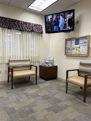 Woman's clinic waiting room. Clean and pretty tidy.