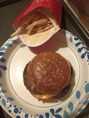 Two identical sandwiches and fries. Double quarter pounder with large fry.