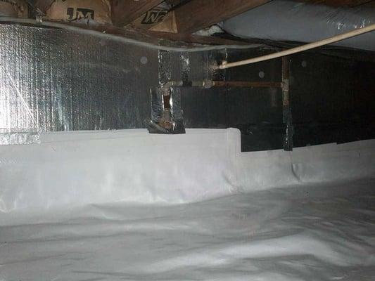 We installed a combination of insulation and vapor barriers in this Clarklake, MI crawl space.