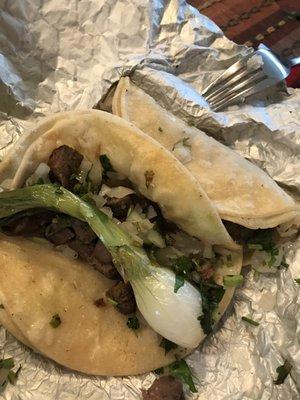 Two of the three, tasty Tacos de Lengua.