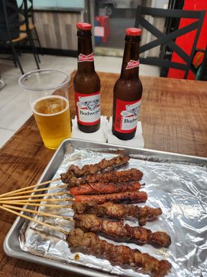 5 Lamb Skewers and 2 Sausage Skewers