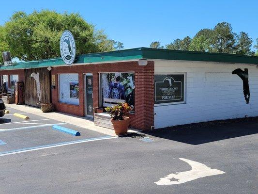 We are located at the North end of the Florida Cracker Trading Co. building.