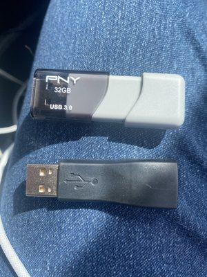 The defected flash drive and the replacement.