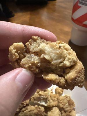 A piece of popcorn chicken.