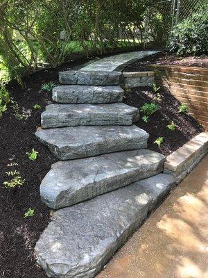 Customer needed safe and beautiful steps and pathway. Naturalized with ferns and Lupines. Project also includes surface drain--mitigate H2O