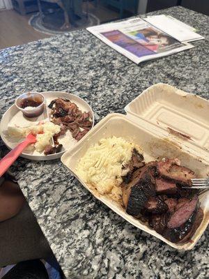 Meat platter with a side of garlic mashed potatoes