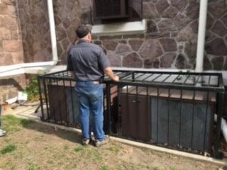 Joe Michalski, owner, performing an estimate at a church in New Jersey.