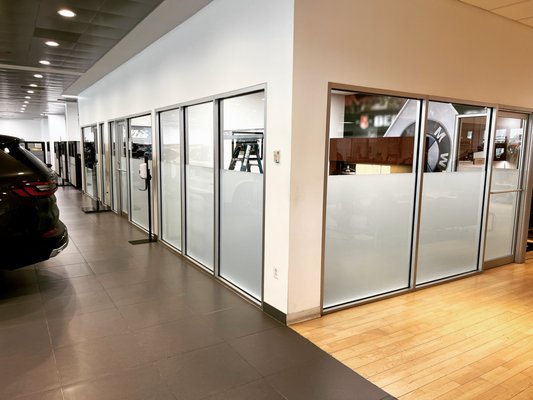 BMW showroom, White Frost installed for privacy.