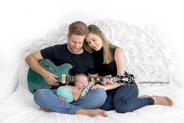 Newborn photo with dad playing guitar, musicians, Jacksonville, Fl