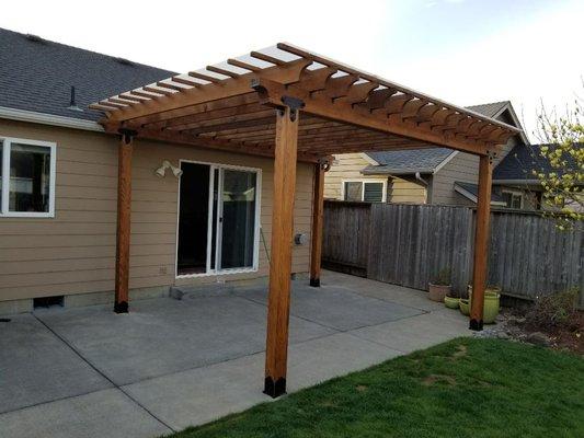 Pergola with clear twin wall poly carbonate roofing.