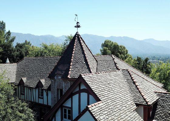 The rotunda is capped with a weather vane adorned with swallows in flight.