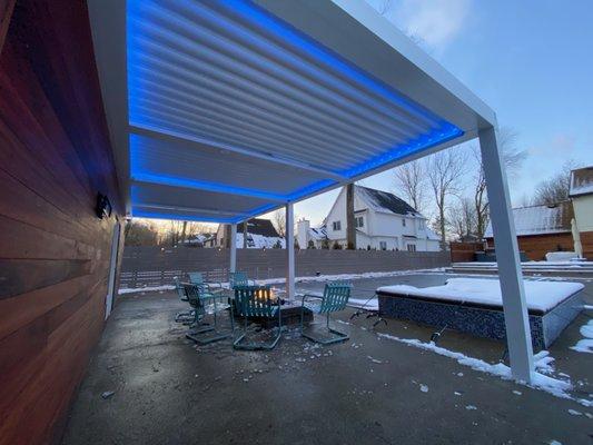 Struxure Outdoor pergola. Waterproof patio cover with automated controls, Phone app to run the motorized louvers