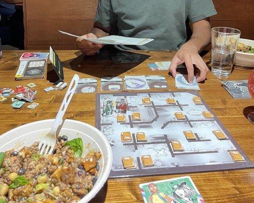 Board games at a large booth (food is not served here, we got it from elsewhere)