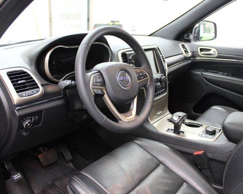 2014 Jeep Grand Cherokee Interior/exterior detail. Exterior road tar removal, clay bar treatment, paint sealant applied, engine bay detailed