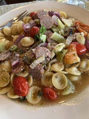 Sausage peppers onions celery pasta and a delicious sauce.