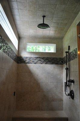 All Around Plumbing, Inc.
 Peaceful shower with natural light