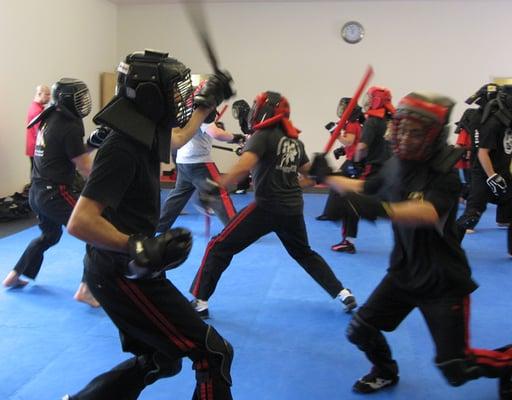 Laban Laro (full contact stick-fighting) sparring sessions in our Filipino Martial Arts program.