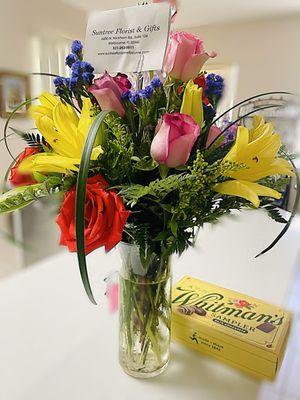 Floral arrangement with chocolate