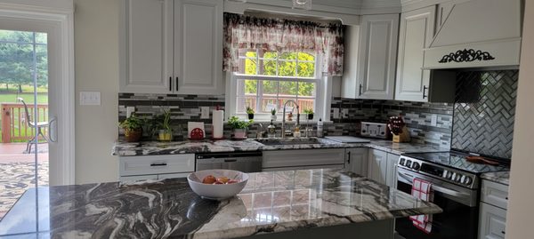 Recent kitchen remodel: Granite countertop, Diamond grey painted cabinets, backsplash tiles