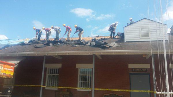 Our roofers tearing out old shingles to completely redo it for a government museum